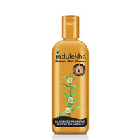 Lakmé Perfect Radiance Fairness Day Creme 50 g & Indulekha Bringha Anti Hair Fall Shampoo, 200ml