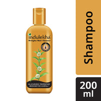 Lakmé Perfect Radiance Fairness Day Creme 50 g & Indulekha Bringha Anti Hair Fall Shampoo, 200ml