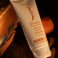 Jivada Luminous Organic Sunscreen with SPF 50+ PA+++ for UV A, UV B | HA, Ceramide, Red Raspberry & Gotu Kola | No White Cast|Carrot & Licorice |All Skin Types | Sulphate & Paraben Free | 100ml