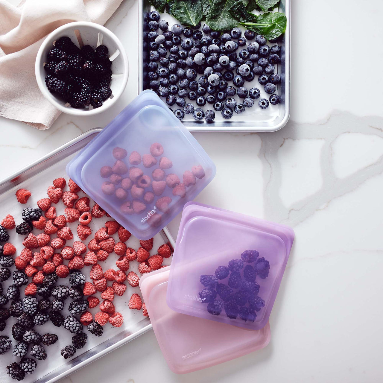 Stasher Reusable Silicone Storage Bag, Food Storage Container, Microwave and Dishwasher Safe, Leak-free, Bundle 4-Pack, Blue + Lavender