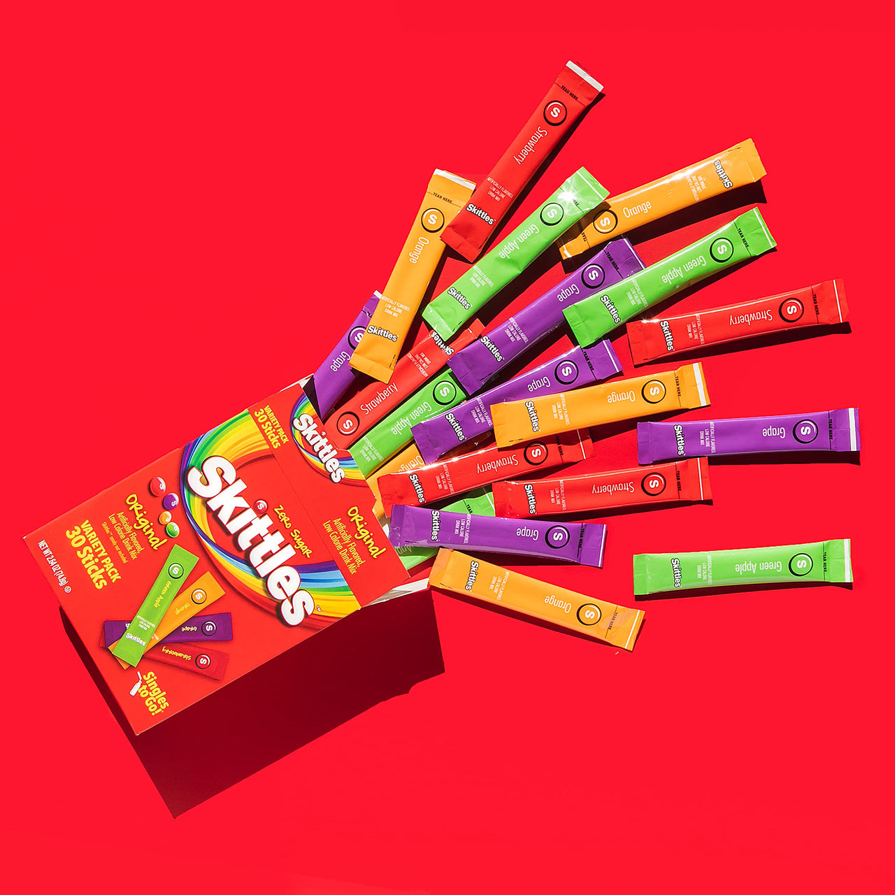 Skittles Singles To Go Variety Pack, Powdered Drink Mix, Zero Sugar, Low Calorie, Includes 4 Flavors: Green Apple, Strawberry, Grape, Orange, 1 Box (30 Single Servings)